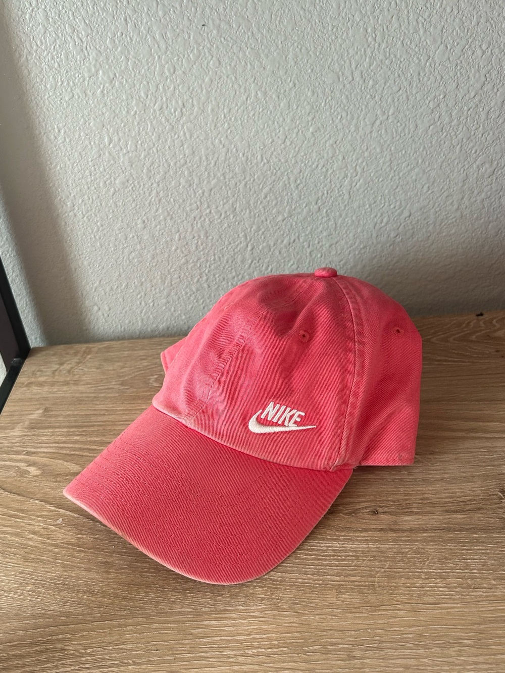 Nike Women’s Coral Pink Baseball Cap with White Swoosh